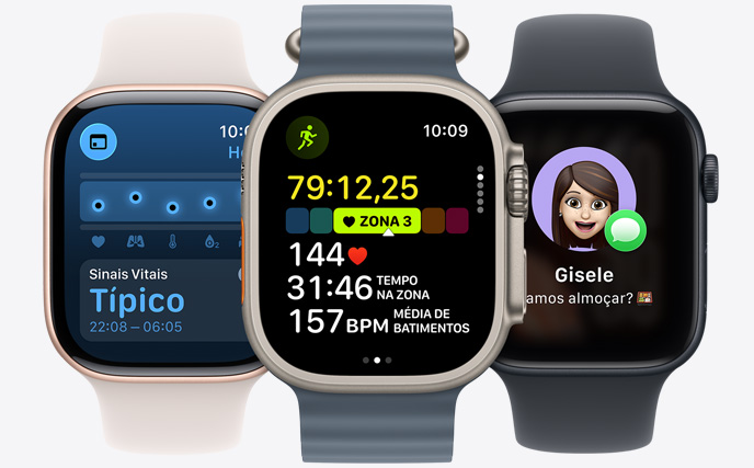 Três modelos de Apple Watch, o do centro na cor natural com a tela exibindo uma corrida em andamento com estatísticas de frequência cardíaca, o da direita na cor preto brilhante com a tela exibindo um Genmoji, o da esquerda na cor de ouro rosa com a tela exibindo o app Sinais Vitais