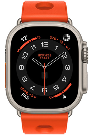 Apple Watch Hermès Ultra 3, cadran analogique Circulaire, (aiguilles des heures, des minutes et des secondes, complications : Météo, anneaux Activité, heure de Paris et Indice UV), boîtier en titane, finition naturelle, côté droit, Digital Crown, bouton latéral en saillie, associée au bracelet Scub’H Diving, orange néon (orange vif), caoutchouc moulé, découpes circulaires centrées