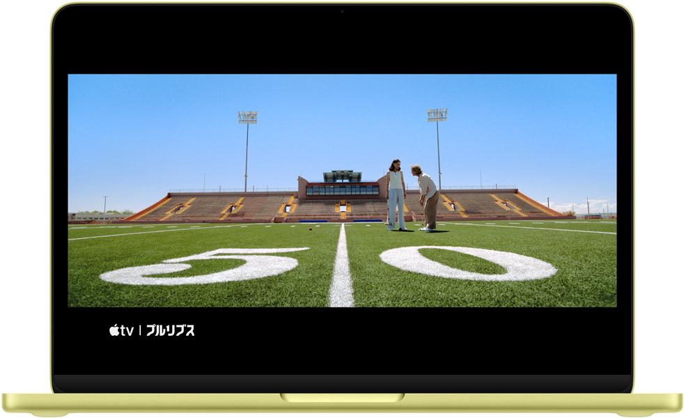 シトラスのMacBook Neo。画面にドラマ「プルリブス」のシーンが表示されている