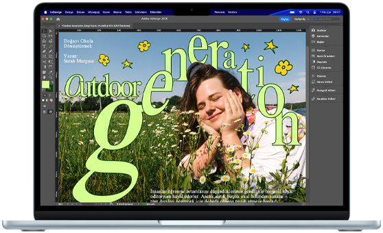 MacBook Air’in ekranında bir Adobe InDesign projesi gösteriliyor